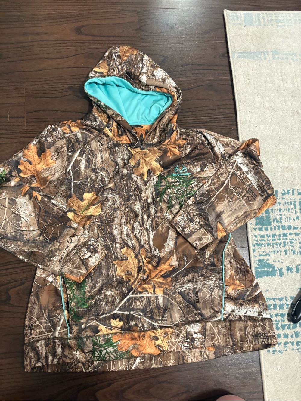 Realtree Brown Camo woman’s Hoodie with Turquoise Lining